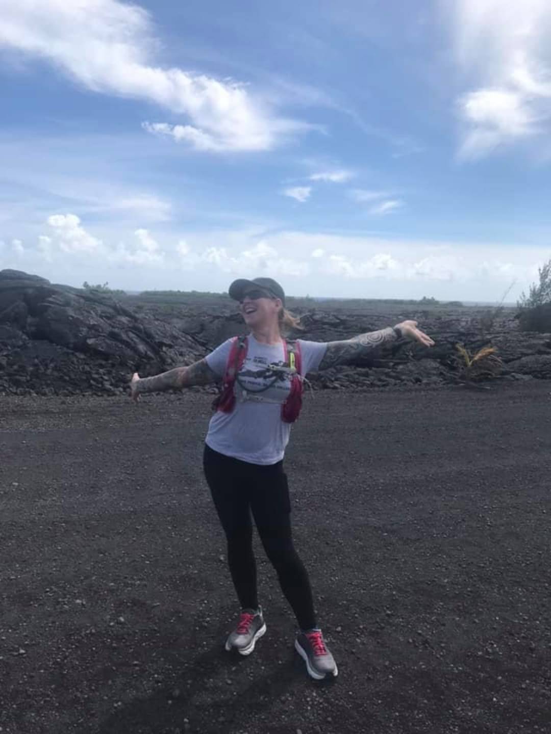 Kimberly Kim on a lava field in Hawaiʻi during volcanic field research